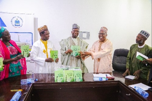 Nilds’ Boss Receives Revised Legislative Drafting Guide in Nigeria